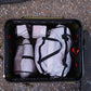 Rux 20L packing bag inside storage bin showing real world gear organization and packing system