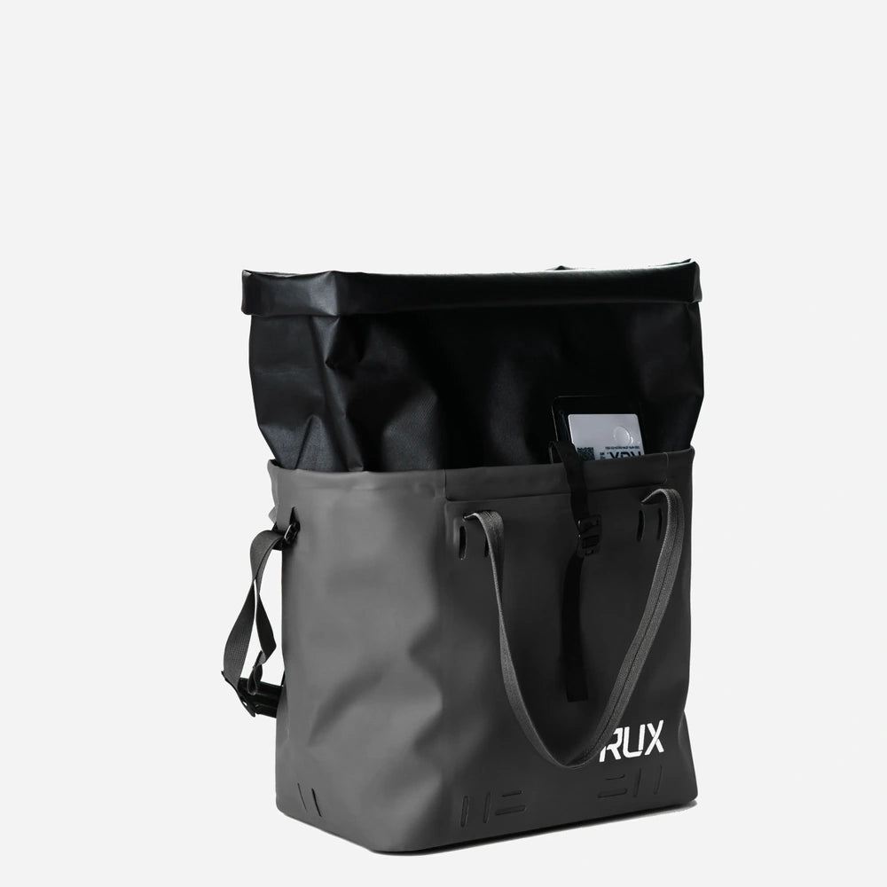 RUX 30L Waterproof Tote in black, black waterproof tote front left rolltop product image on white background