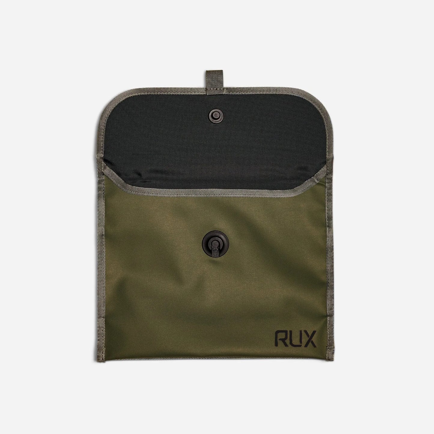 Rux 3L Pocket open showing interior storage space and waterproof lining.