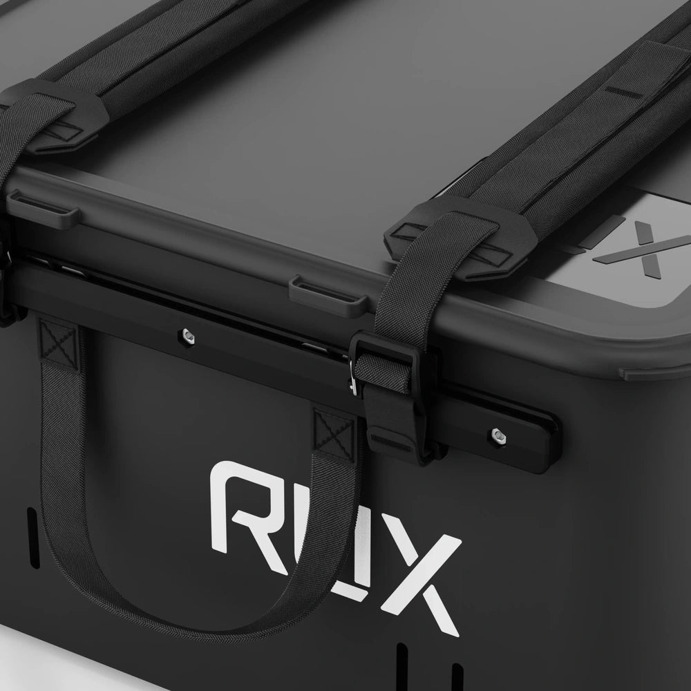 RUX 40L black camping storage box close-up of lid rail, buckle, straps, and RUX branding