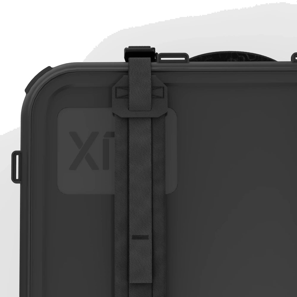 RUX 40L black storage container close-up of lid strap, buckle, and top attachment detail