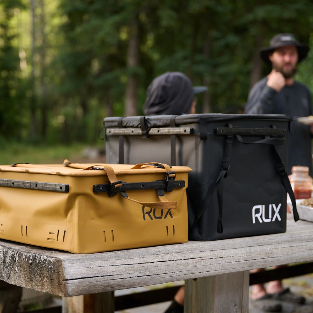 RUX 40L collapsible gear box in bronze color featuring camping outdoor gear storage box lifestyle