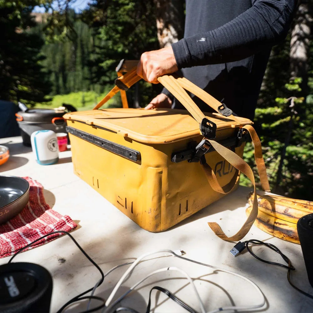 rux 40l tote held using straps sitting on truck