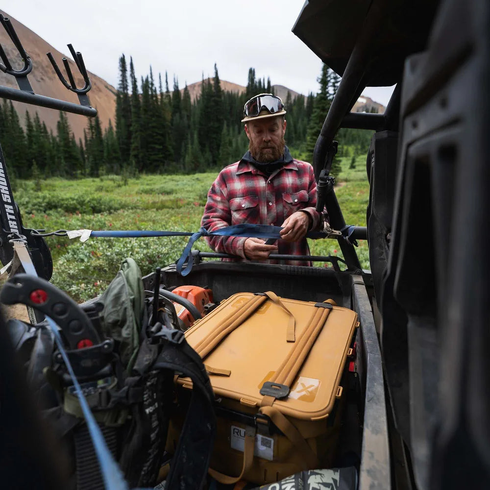 Rux 40L Tote in bed of ATV. 