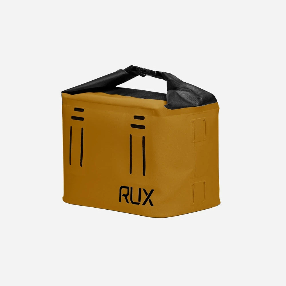 RUX 5L Cooler in bronze, angled side view showing roll-top closure and side slots.