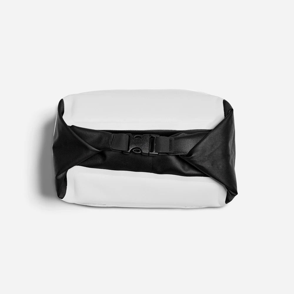 RUX 5L Cooler in white, top view showing black buckle closure and roll-top design.