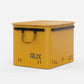 Rux 70L Press-Seal bronze container clean angled view with closed lid, reinforced rails, and front carry handle.