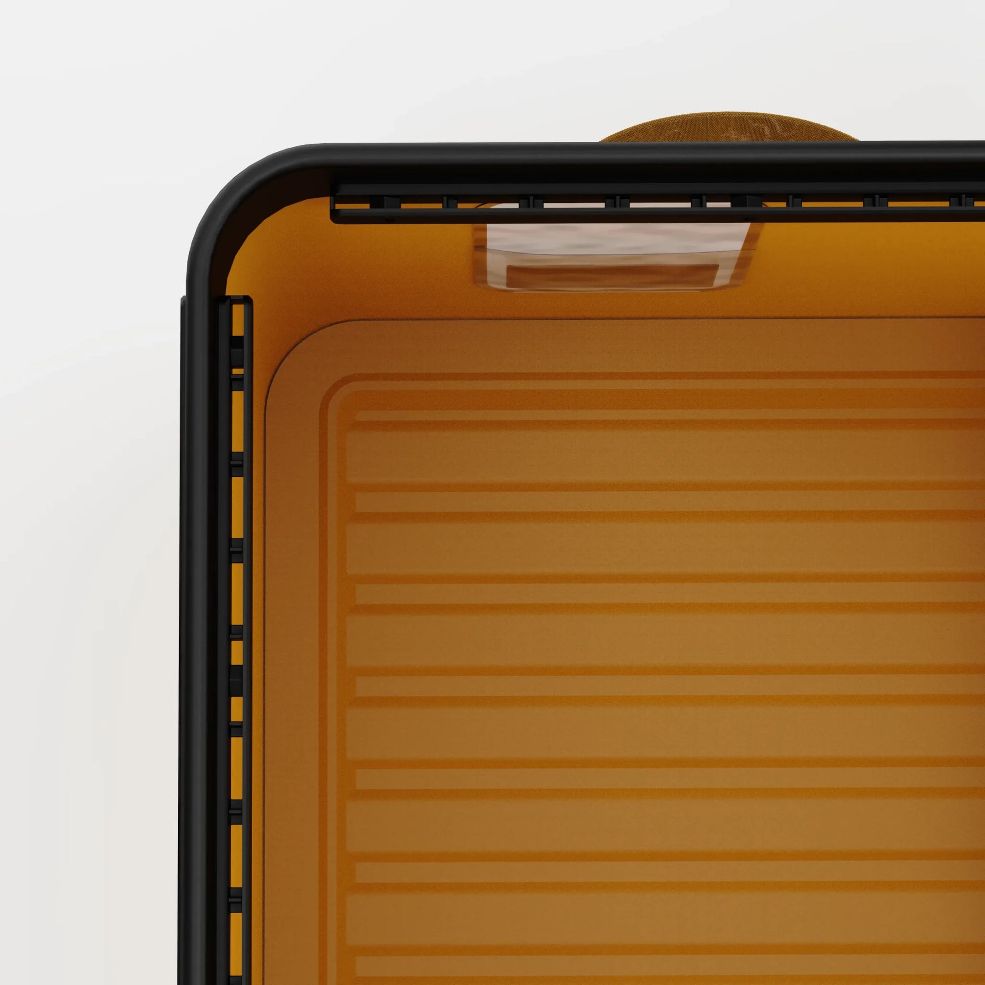 Rux 70L Press-Seal bronze container interior corner close-up showing reinforced frame, lid structure, and molded storage base.