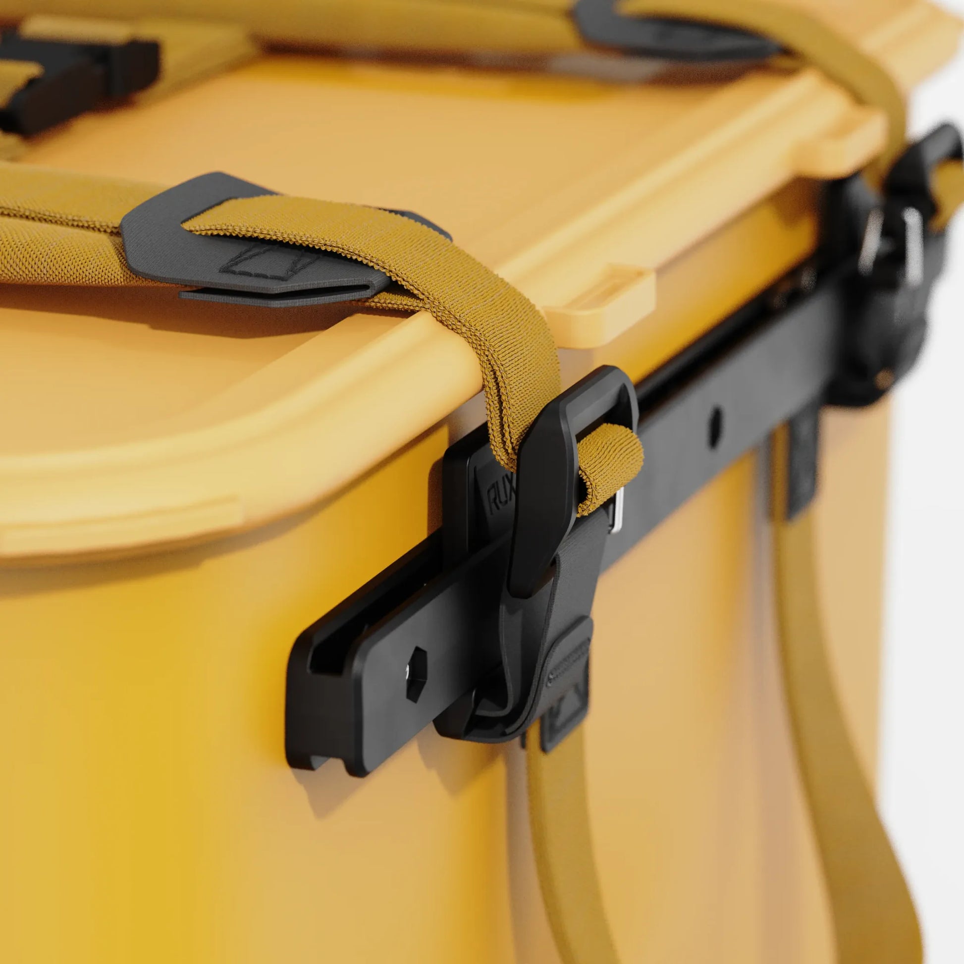 Rux 70L Press-Seal bronze container close-up of latch, rail hardware, strap connection, and durable side mounting system.