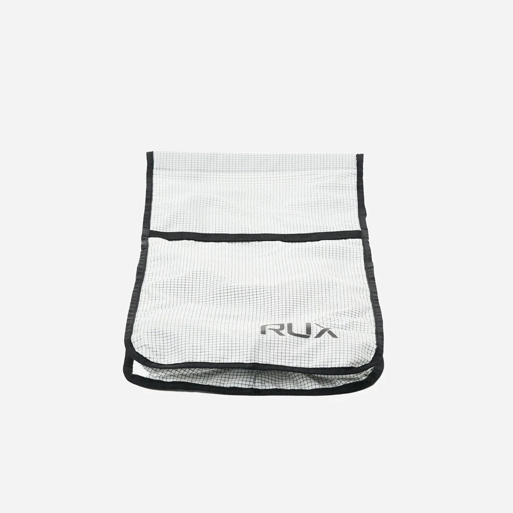 Rux Packing Cube 10L top flap view demonstrating secure closure system and flexible opening