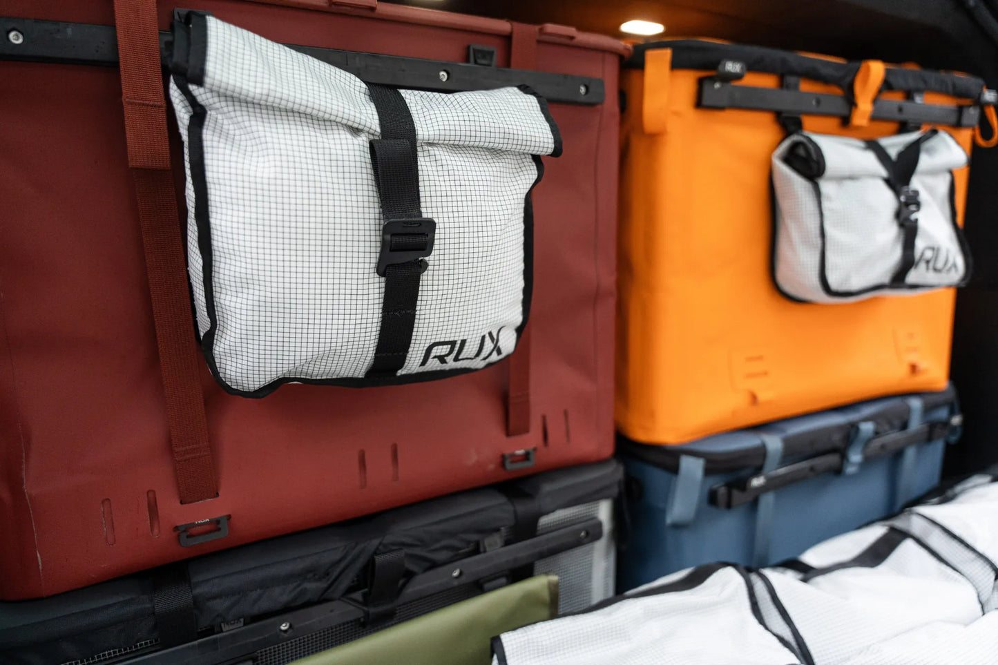Rux Packing Pocket 2L mounted on storage bin organization system