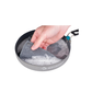 Sea to Summit camp kitchen washcloth being used to clean cookware in outdoor camping setup