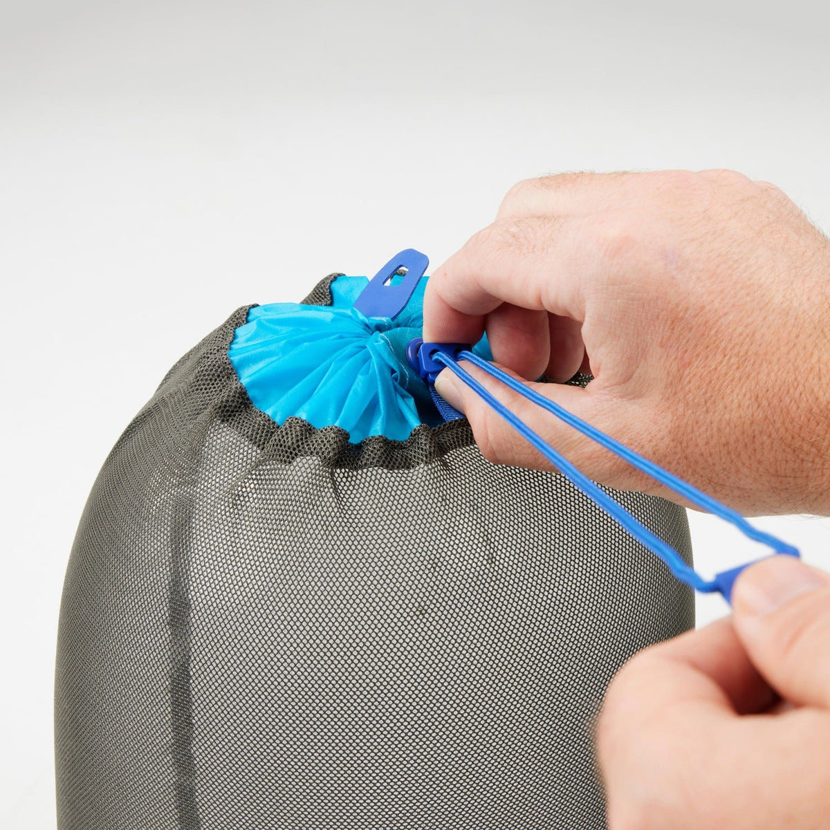Close-up of the Sea to Summit mesh stuff sack’s drawcord and cordlock closure