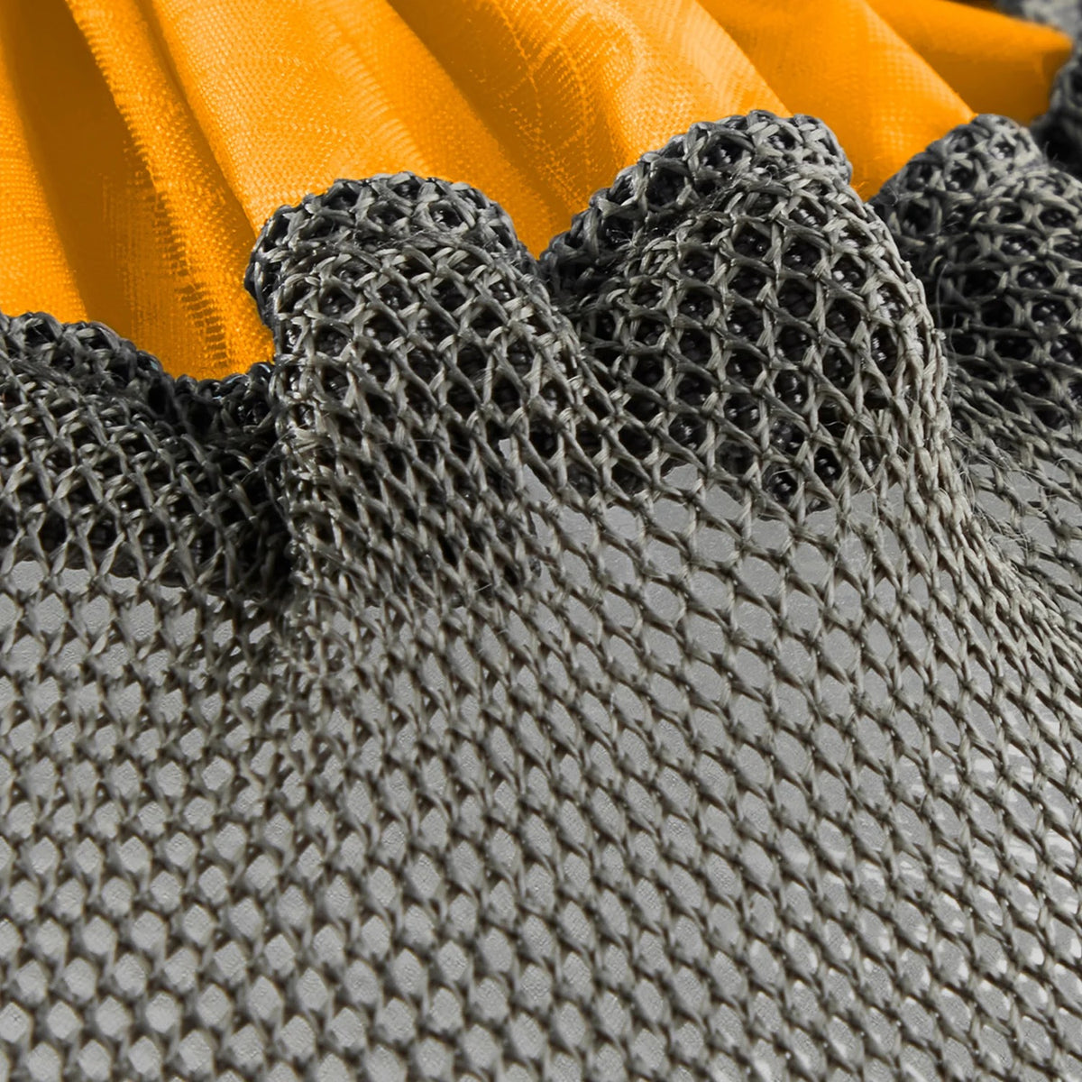 Close-up of the Sea to Summit mesh stuff sack’s breathable mesh weave and drawcord throat