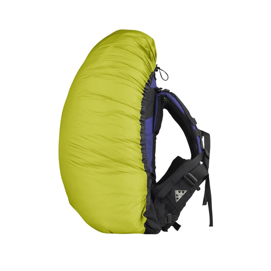 Sea to Summit Ultra-Sil Pack Cover in lime green protecting backpack from rain, ultralight waterproof cover for hiking and backpacking
