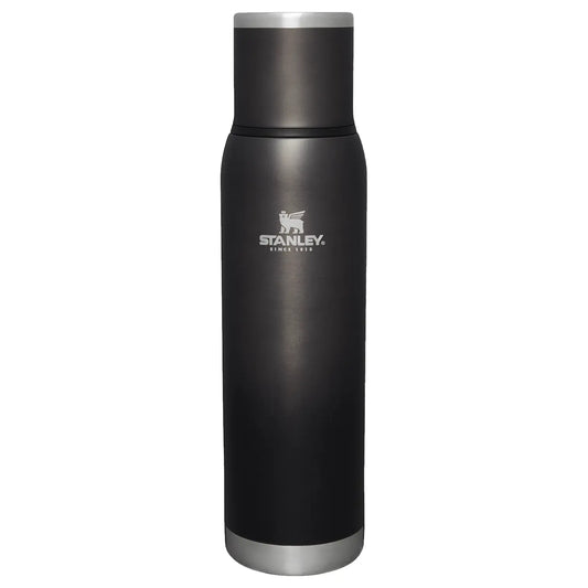 Stanley Adventure To-Go Bottle 1.4 QT in Black, front view with Stanley logo and stainless steel base