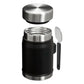 Stanley Adventure To-Go Food Jar and Spork 24oz in Matte Black exploded view on white background showing all components separated: polished stainless steel lid floating above, open matte black jar body with stainless steel rim and threads visible, and black folding spork placed to the side