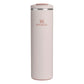 Stanley AeroLight Transit Bottle 20oz in Rose Quartz front hero on white background showing slim pale blush pink matte cylindrical bottle with Stanley winged bear logo, stainless steel trim ring at the neck, and rose quartz flip-top lid with press-button latch