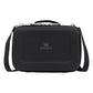 Stanley All Day Midi Lunch Box 6.3QT in Black front hero on white background showing black hard-shell EVA lunch box with black textured exterior, Stanley winged bear logo embossed on the front panel, top carry handle with zipper pulls, and black Stanley-branded shoulder strap attached to side D-rings