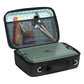 Stanley All Day Midi Lunch Box 6.3QT in Black open view on white background showing the lunch box filled with food and gear: lid organizer pocket holding a snack bar, trail mix bag, and metal utensil set, with a green Stanley food container fitting snugly in the main compartment below