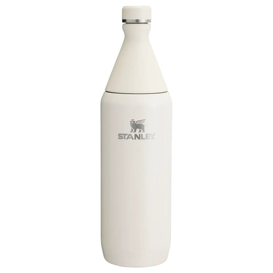 Stanley All Day Slim Bottle 34 OZ in Cream Gloss, front view with Stanley logo and cap