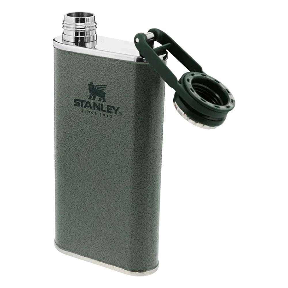 Stanley Classic Easy Fill Wide Mouth Flask 8oz in Hammertone Green three-quarter view on white background with cap open and swung to the side on its connected bail, revealing the wide mouth stainless steel opening for easy filling