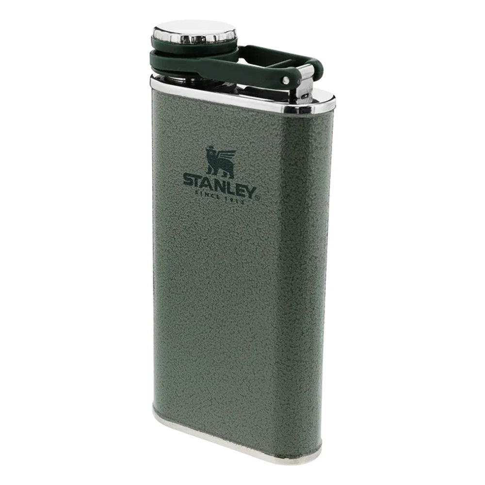 Stanley Classic Easy Fill Wide Mouth Flask 8oz in Hammertone Green three-quarter front view on white background showing hammertone green enamel body, connected cap with bail hinge closed on top, stainless steel rim, and Stanley Since 1913 logo with bear icon