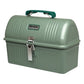 Stanley Classic Lunch Box 5.5QT in Hammertone Green three-quarter view on white background showing hammertone green metal dome-lid lunch box with ribbed top, green arched carry handle, white oval Stanley Since 1913 badge, and single silver metal latch buckle on the front face