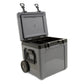 Stanley The Cold For Days Wheeled Outdoor Cooler 50QT in Charcoal Black side-angle open view on white background showing the gray charcoal body with lid fully hinged back, dark gray interior with black wire basket insert, black side carry handle, and large black all-terrain wheel at the base
