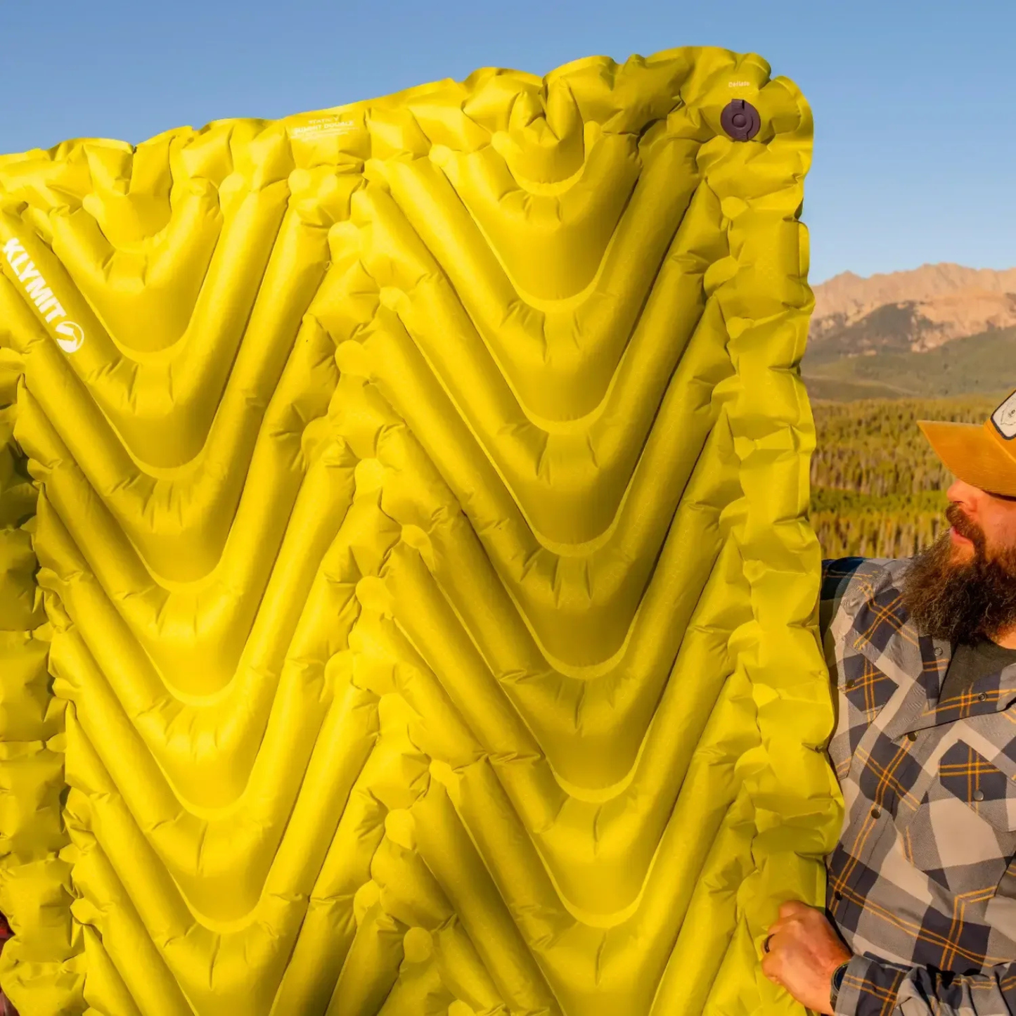 Fully inflated Klymit Static V Summit Double sleeping pad standing upright