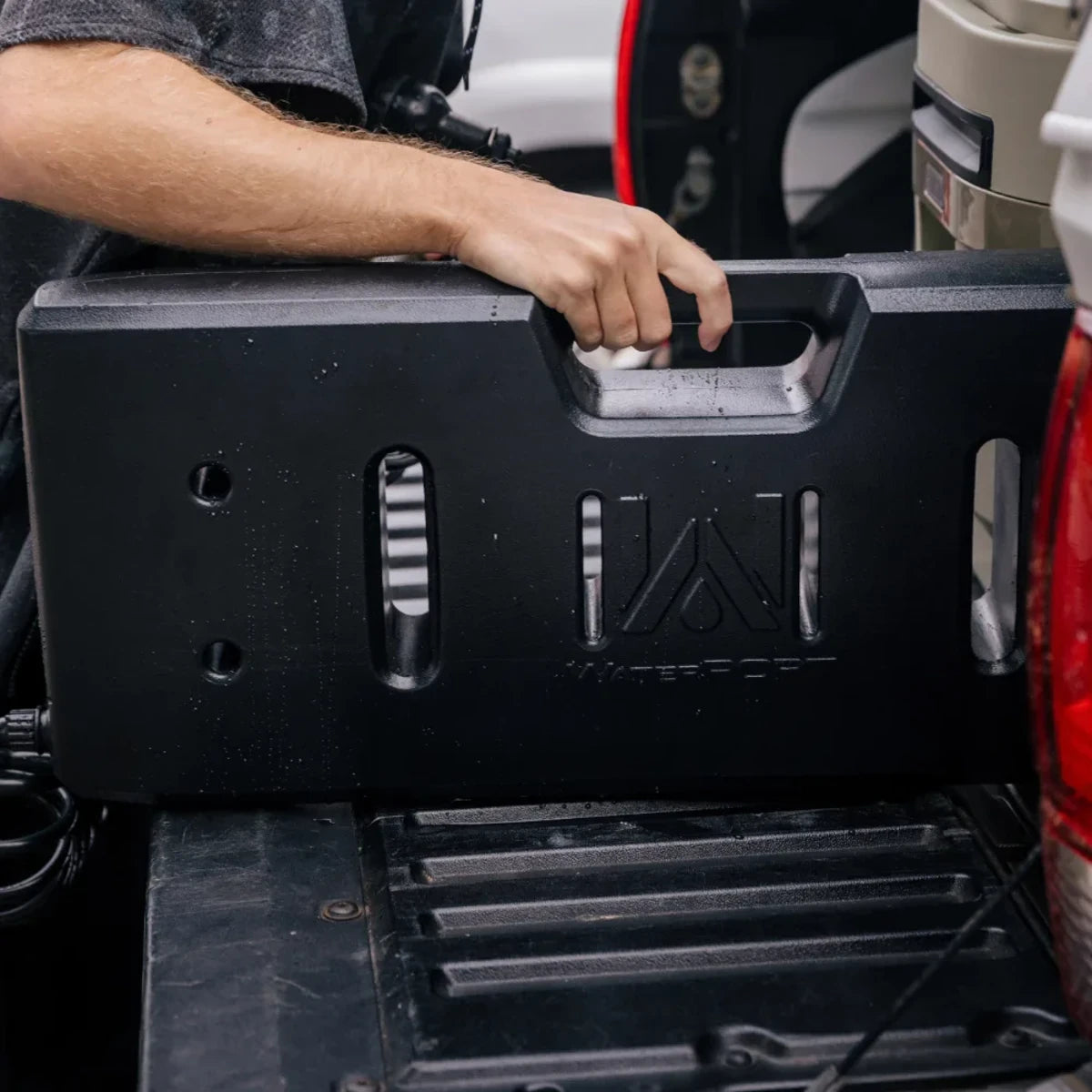 Carrying WaterPORT Overlander tank using built-in handle